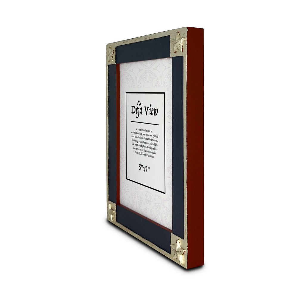 Handmade decorative picture frame with white gold star accents on a white background